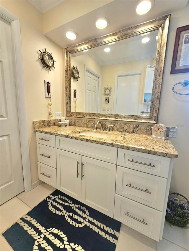 1706 S Lakeside Ct, Venice, FL 34293 - bathroom featuring recessed lighting, tile patterned flooring, and vanity