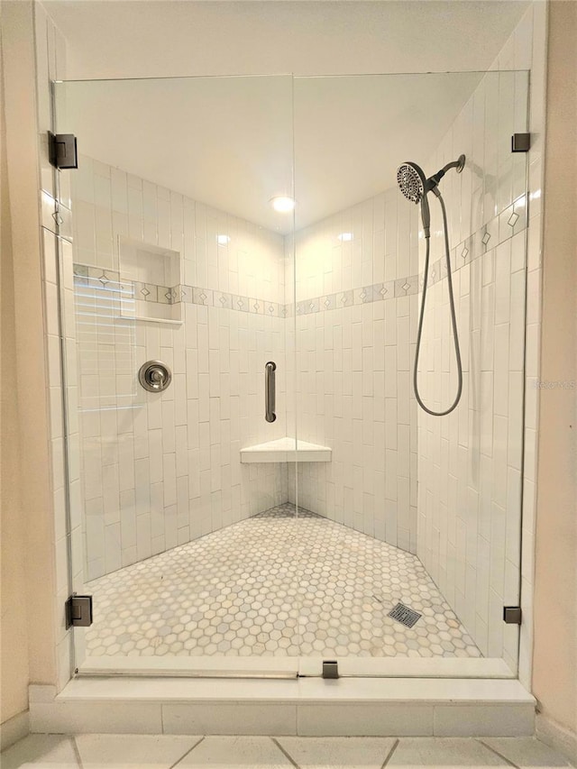 1706 S Lakeside Ct, Venice, FL 34293 - bathroom featuring a shower stall