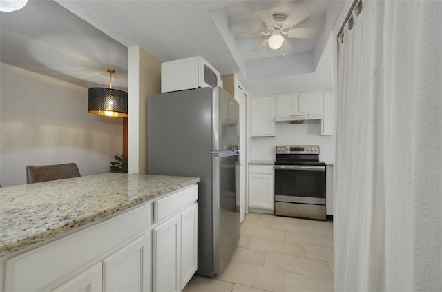 4300 Hector Ct Unit 7, Orlando, FL 32822 - kitchen featuring appliances with stainless steel finishes, white cabinetry, under cabinet range hood, and light stone counters