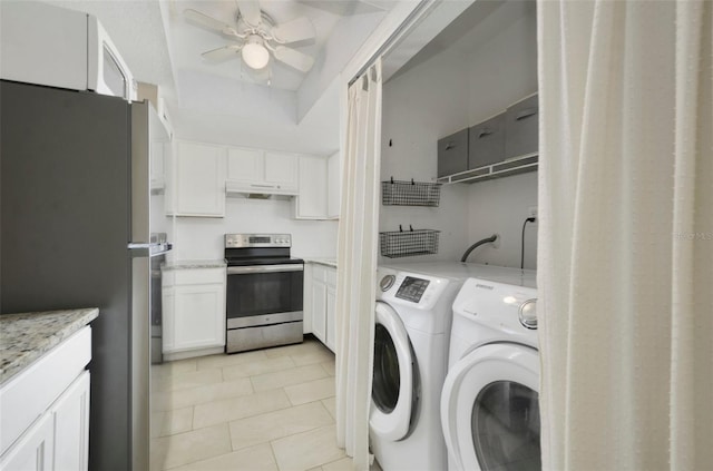 4300 Hector Ct Unit 7, Orlando, FL 32822 - laundry room with laundry area, separate washer and dryer, a ceiling fan, and light tile patterned flooring