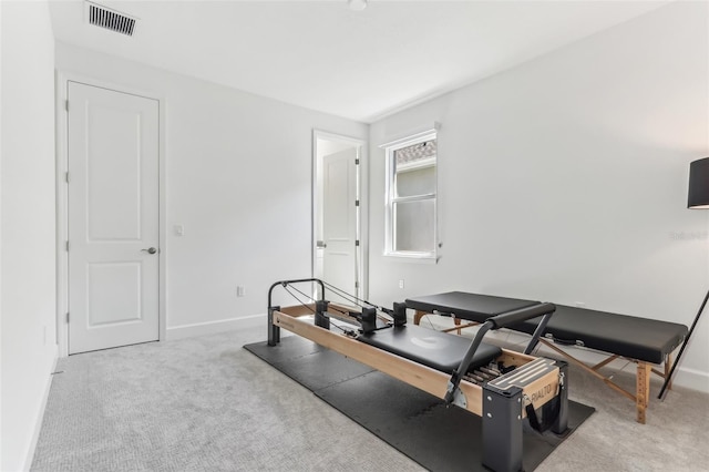 interior space featuring carpet, visible vents, and baseboards