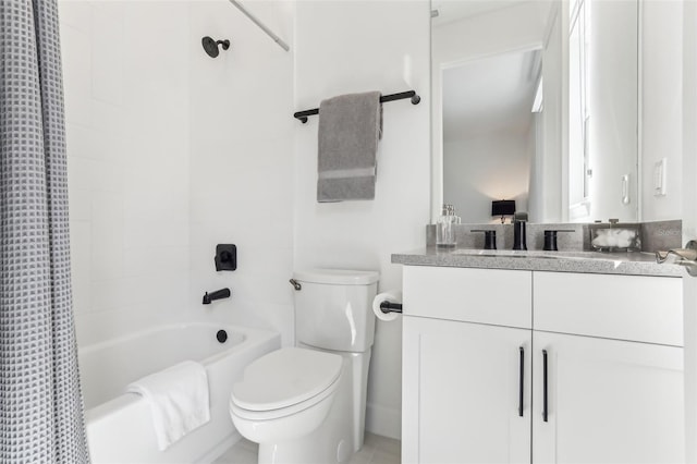 bathroom featuring shower / tub combo, vanity, and toilet