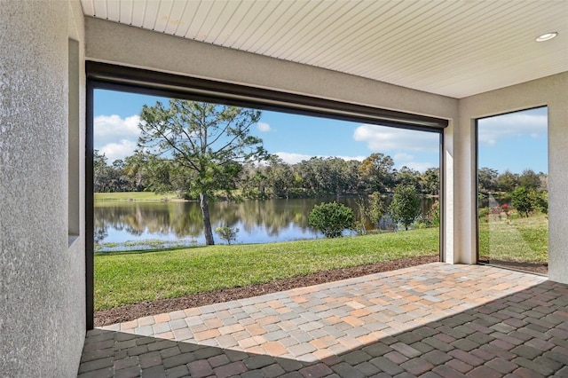 view of patio / terrace featuring a water view