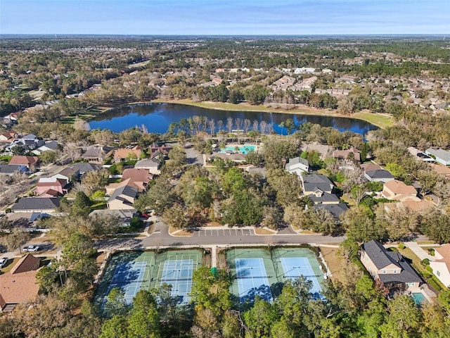 bird's eye view featuring a water view and a residential view