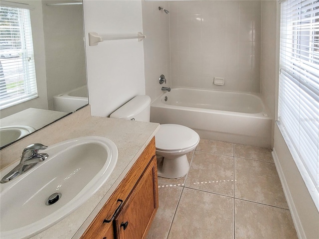 full bath featuring  shower combination, vanity, toilet, and tile patterned floors