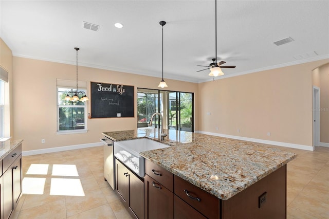 kitchen with a wealth of natural light, visible vents, a sink, and dishwasher