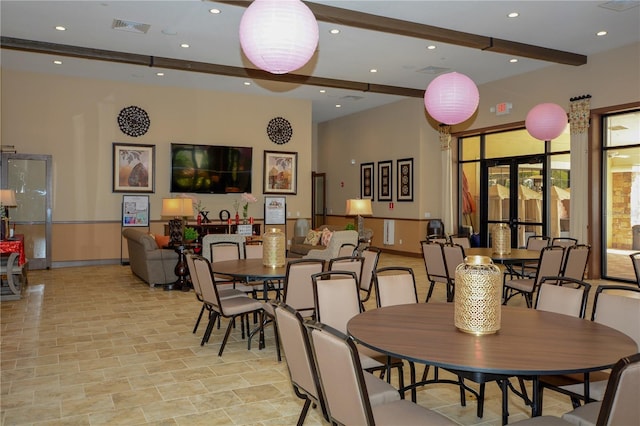 dining area with baseboards, visible vents, beam ceiling, and recessed lighting