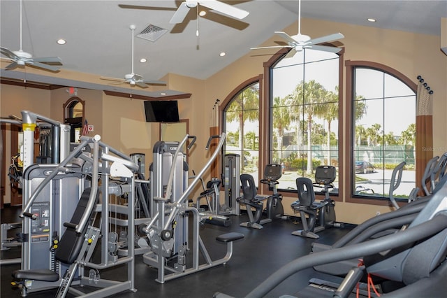 gym with lofted ceiling, visible vents, and recessed lighting