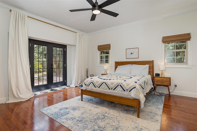 bedroom with wood finished floors, baseboards, access to exterior, ornamental molding, and french doors