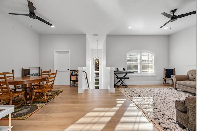 living area featuring visible vents, a ceiling fan, recessed lighting, light wood finished floors, and baseboards