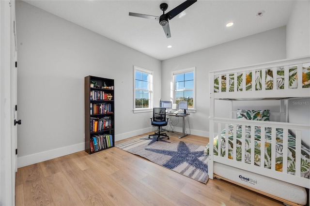 bedroom featuring recessed lighting, ceiling fan, baseboards, and wood finished floors