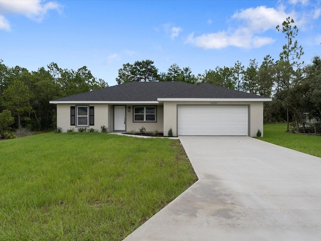 single story home featuring a garage, stucco siding, concrete driveway, and a front yard