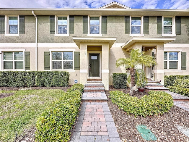 view of front of home featuring stucco siding