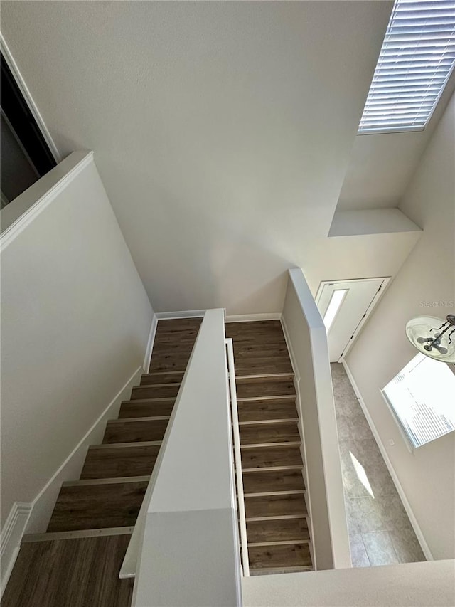 staircase with baseboards