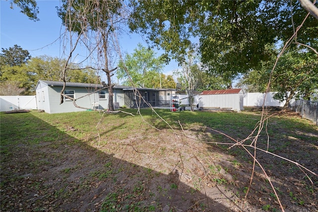 view of yard featuring a fenced backyard