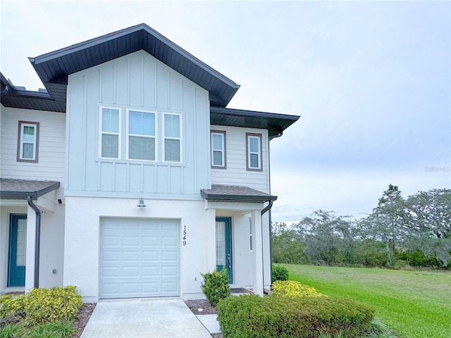 view of front facade featuring a front lawn and board and batten siding