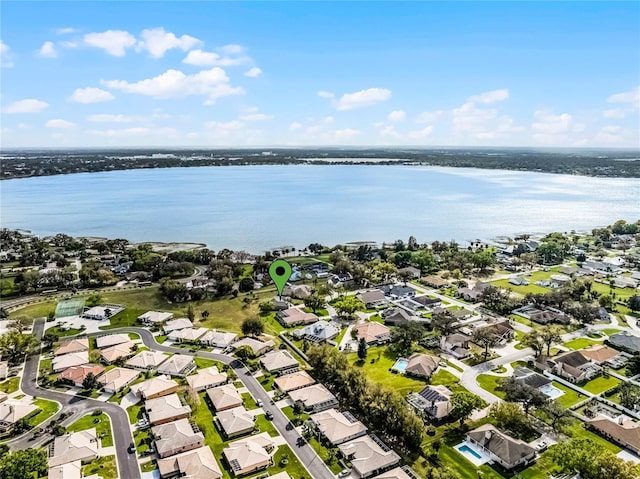 aerial view with a water view and a residential view