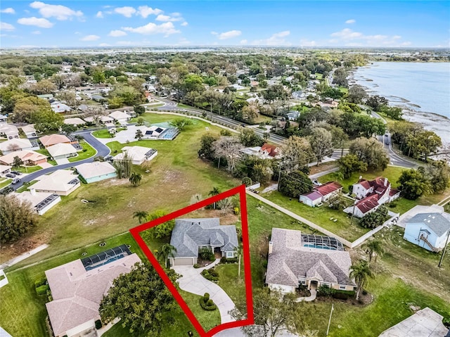 aerial view featuring a water view and a residential view