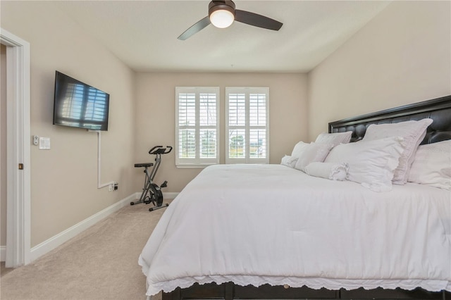 bedroom featuring ceiling fan, baseboards, and carpet flooring