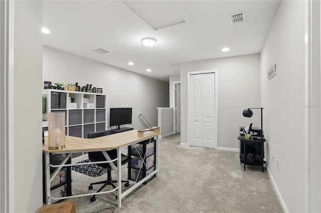 office featuring baseboards, visible vents, carpet flooring, and recessed lighting