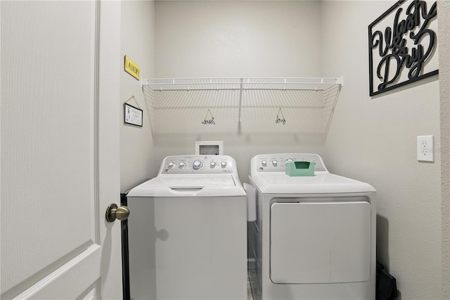 laundry area featuring laundry area and independent washer and dryer