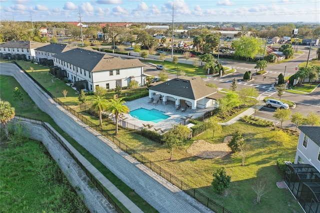 birds eye view of property with a residential view