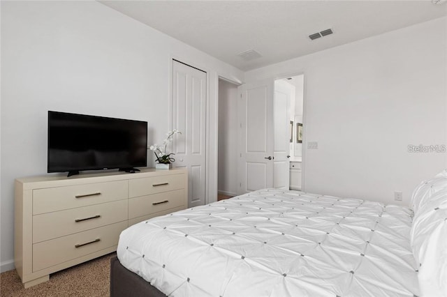 bedroom featuring visible vents