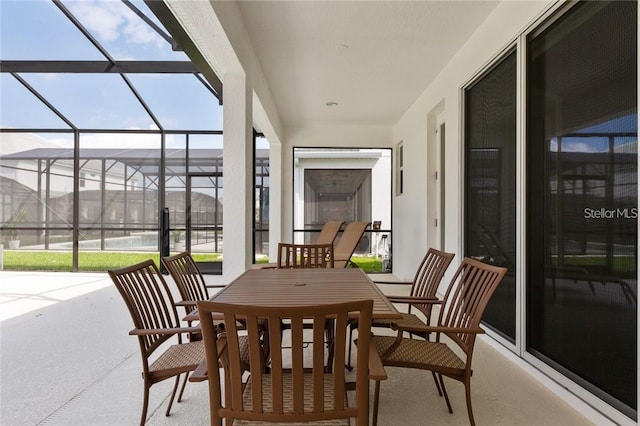 view of patio / terrace with a lanai