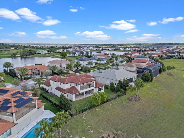 aerial view with a water view and a residential view