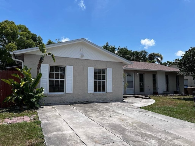 131 San Blas Ave, Kissimmee, FL 34743 - ranch-style house with fence and stucco siding
