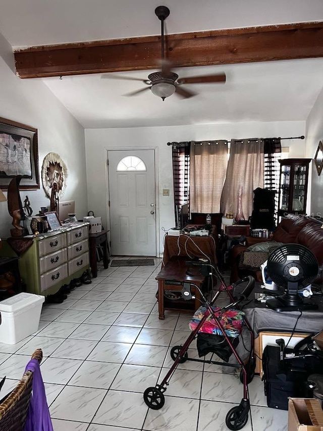 131 San Blas Ave, Kissimmee, FL 34743 - foyer with light marble finish floors, beam ceiling, and ceiling fan