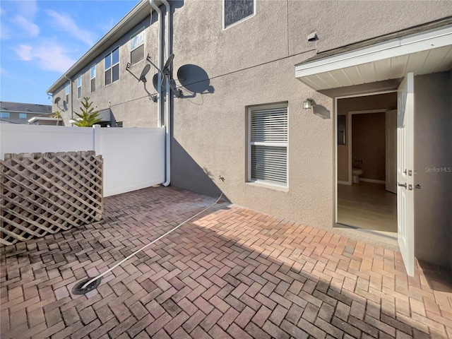 view of patio / terrace with fence