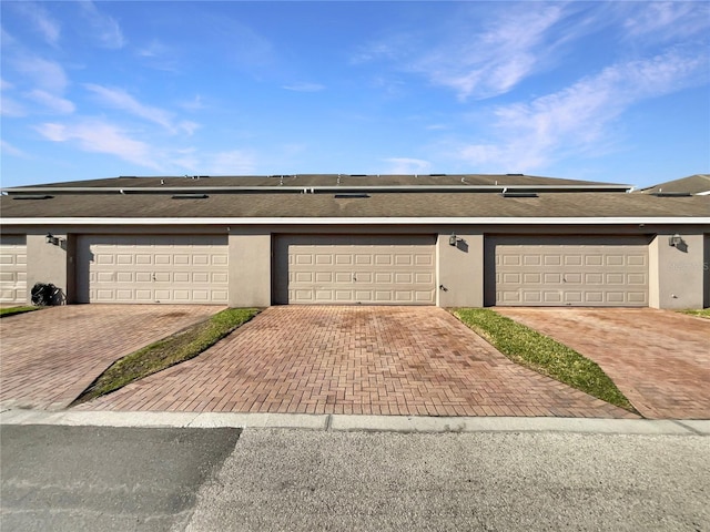 garage with driveway