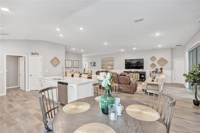 dining area featuring recessed lighting, visible vents, and light wood finished floors