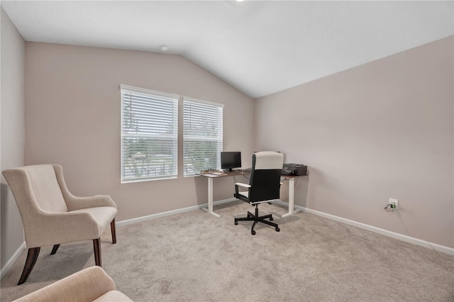 office space with lofted ceiling, carpet flooring, and baseboards