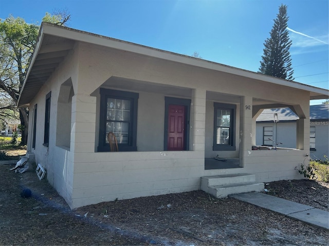 bungalow-style house featuring covered porch