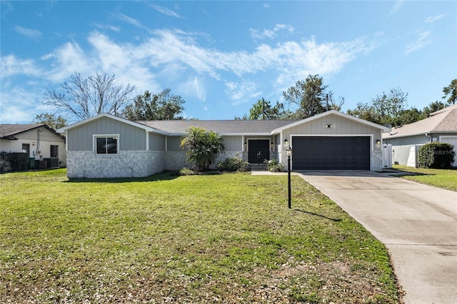 ranch-style house with a front yard, driveway, and an attached garage