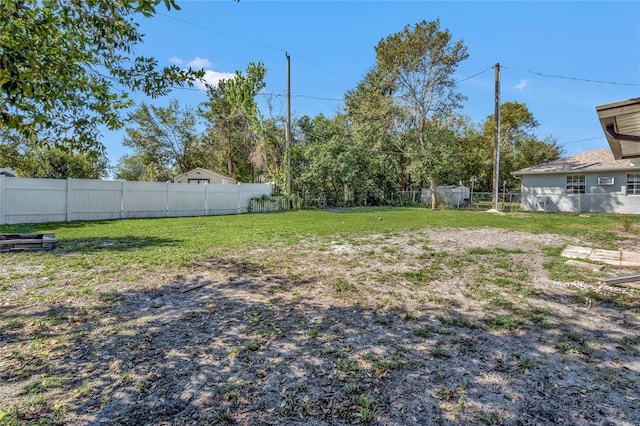 view of yard featuring a fenced backyard