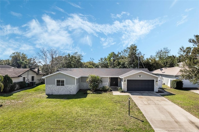 ranch-style house featuring an attached garage, driveway, stone siding, and a front yard