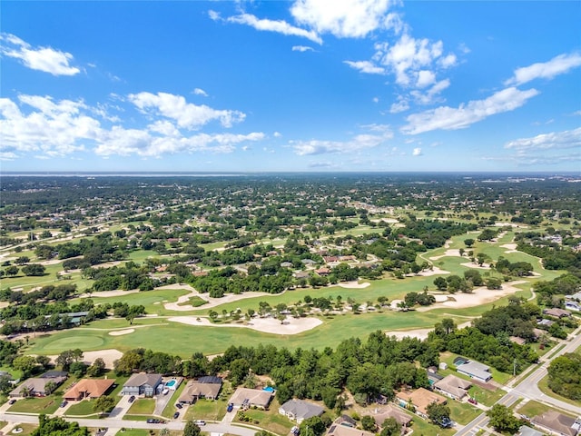 birds eye view of property featuring golf course view