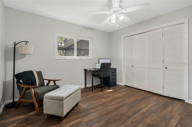 home office with ceiling fan, dark wood-style flooring, and baseboards