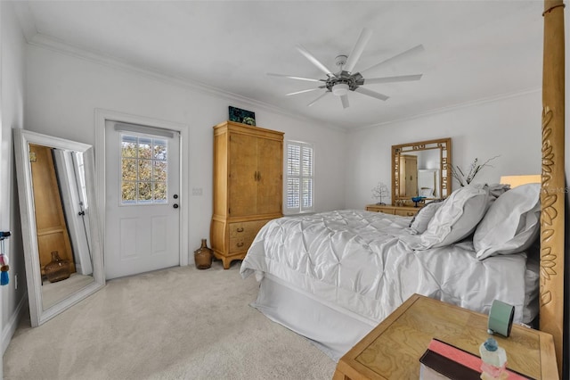 bedroom featuring ornamental molding, multiple windows, and carpet flooring