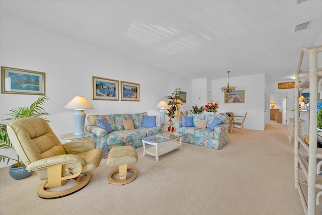 living area featuring visible vents and light colored carpet