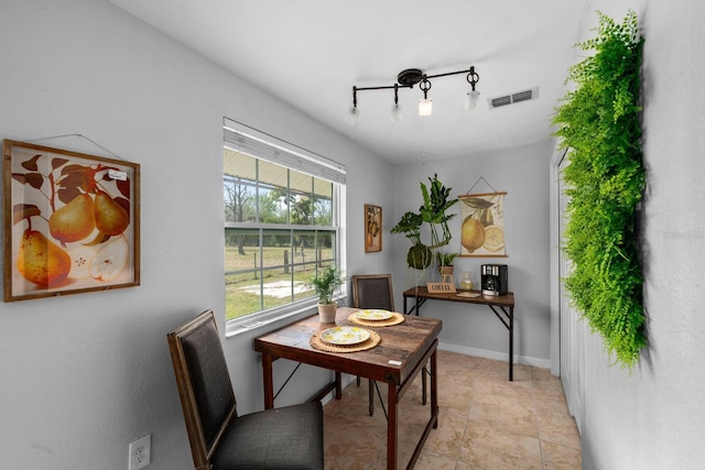 home office featuring visible vents and baseboards