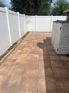 view of patio with fence