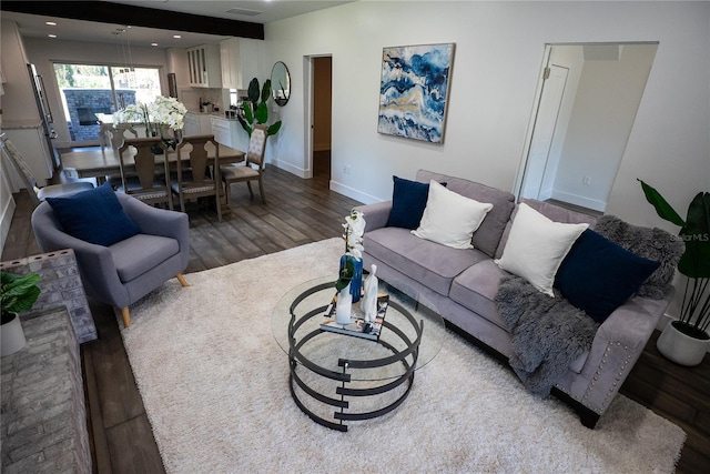 living area featuring recessed lighting, wood finished floors, and baseboards