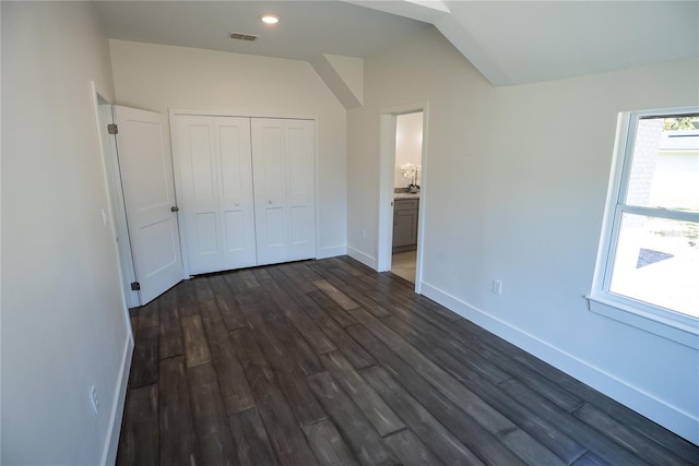 unfurnished bedroom with recessed lighting, visible vents, baseboards, a closet, and dark wood-style floors