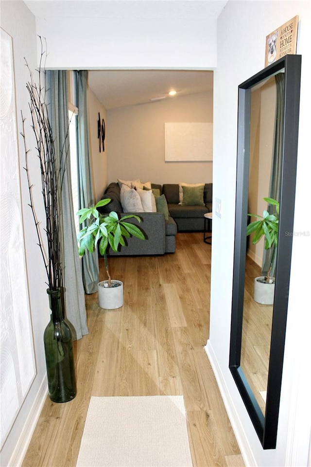 living area featuring light wood-style flooring