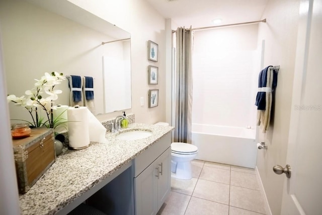 full bathroom featuring toilet, shower / tub combo, vanity, and tile patterned floors