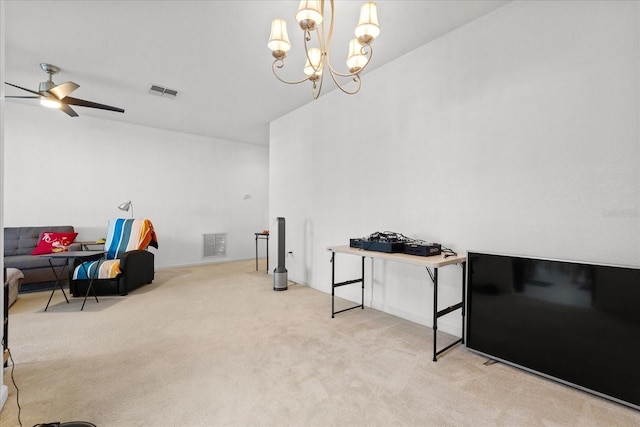 rec room featuring carpet floors, visible vents, and ceiling fan with notable chandelier